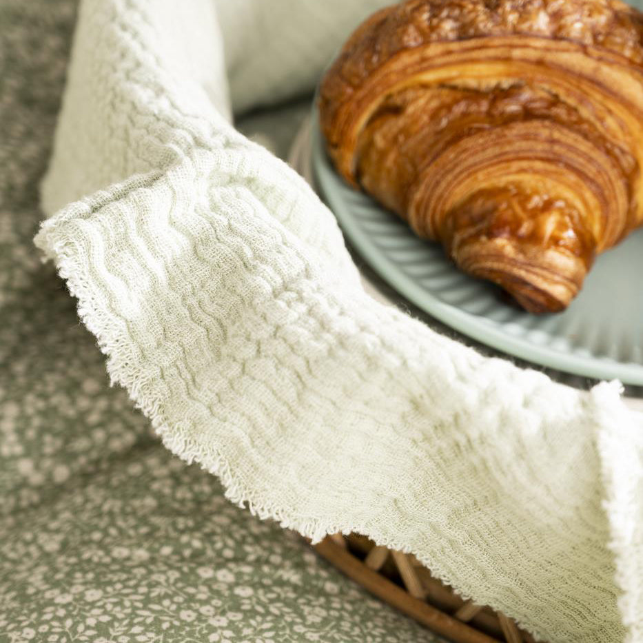 Serviet i stof støvet grøn